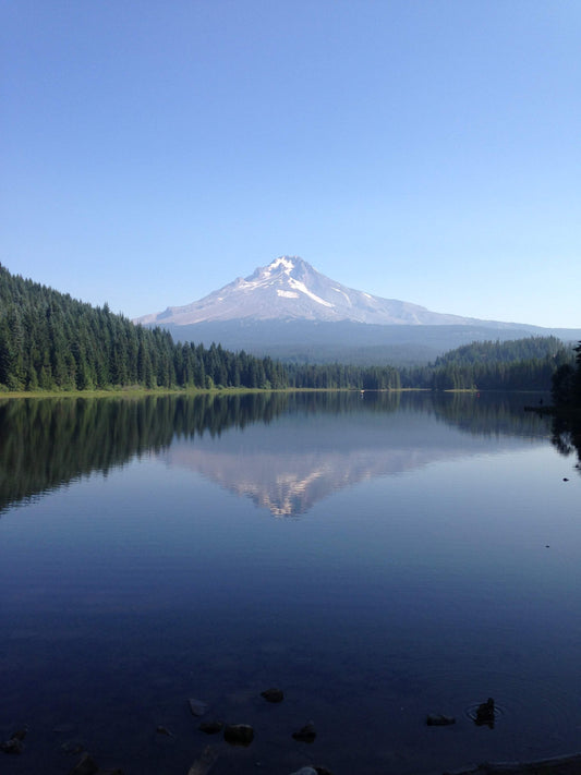 Snow-covered Mount Hood reflected in a mountain lake